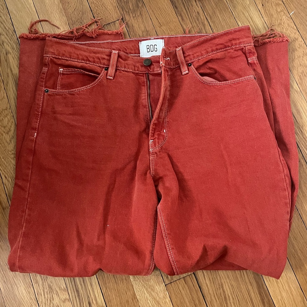 Rust colored BDG split hem jeans